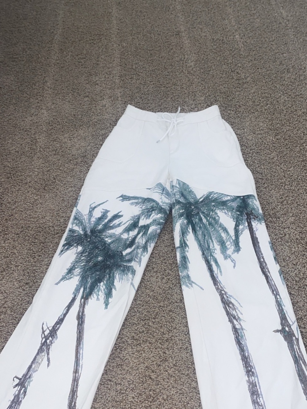 Woman’s White Palm-Print Wide Leg Pants yellow the label